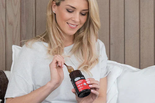 Lady eating Manuka Honey